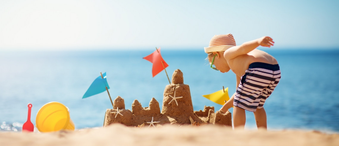 Toddler making sand castle - Vuly Play.jpg